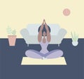 A black woman meditates. A black woman meditates in the Lotus position. Yoga classes at home. Maintaining psychological health. Ps